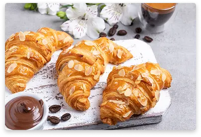 Flaky croissant filled with rich condensed milk cream