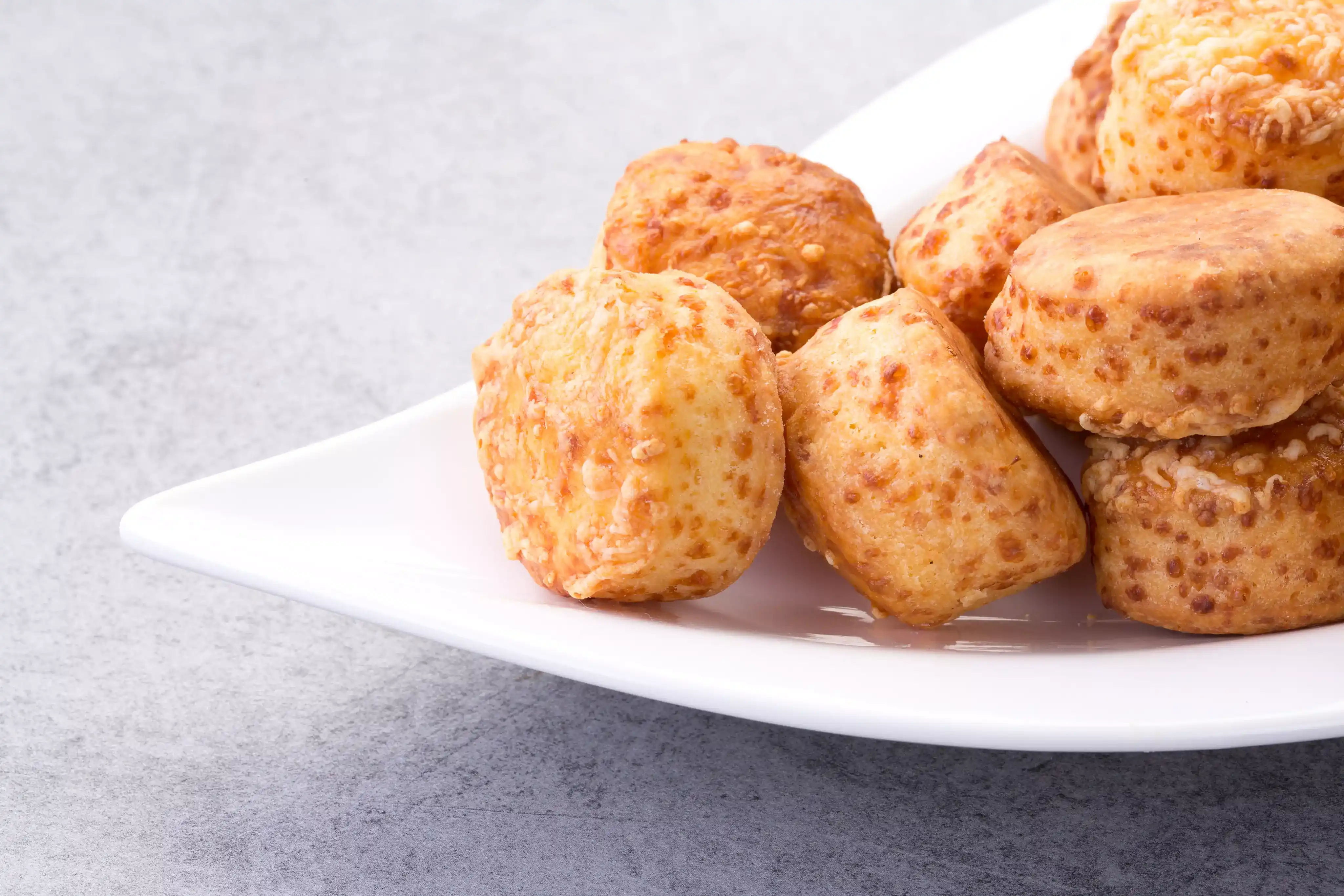 Golden brown puff pastries with sweet and savory fillings like cream, chocolate, and vegetables